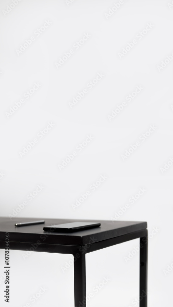 Minimal business background with a white table, vertical orientation. Features a smartphone, pen, and open space, creating a clean and modern look Minimal business background with a white table, vertical orientation. Features a smartphone, pen, and open space, creating a clean and modern look