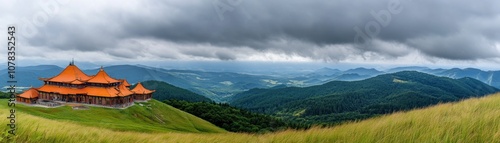 Panoramic view of a temple on a hillside surrounded by mountains and cloudy skies.