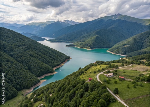 Breathtaking Aerial View of Nariana Lake in Gudamakari, Surrounded by the Majestic Caucasus Mountains and Lush Alpine Landscape in Georgia's Scenic Wilderness photo