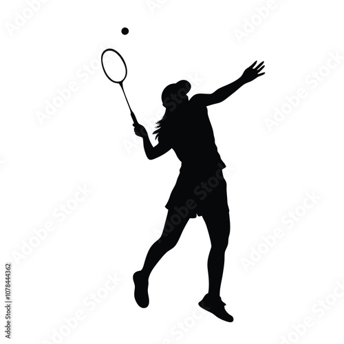 A woman is playing badminton and holding a racket. She is in the air and has a racket in her hand
