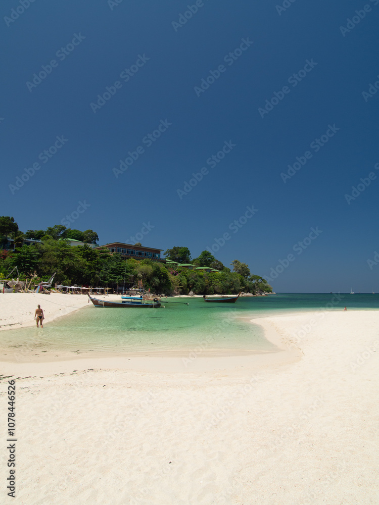 Fototapeta premium Scenic Tropical Beach with Calm Waters and White Sand in Thailand, Koh Lipe 