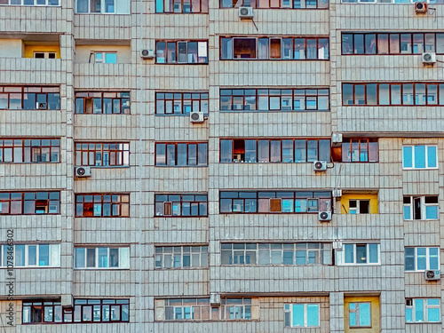 Facade of a multi-storey residential building with windows