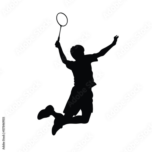 A man is playing badminton and jumping in the air. He is holding a racket. The racket is black and white