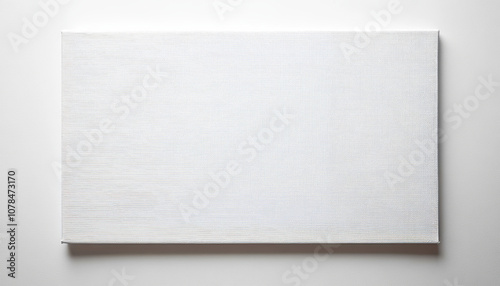 Empty white canvas with a subtle textured surface on a white background, ideal for art, creativity, or minimalist design concepts. 