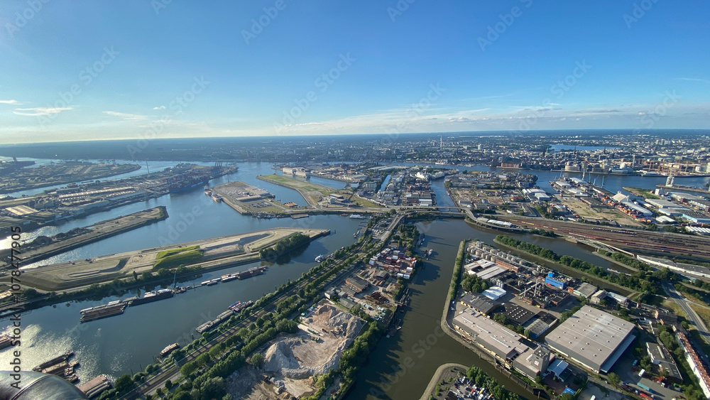 Fototapeta premium Aerial View of Expansive Modern Port with Cityscape in Background