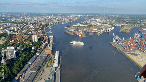 Aerial View of Vibrant Port City with Ships and Docks