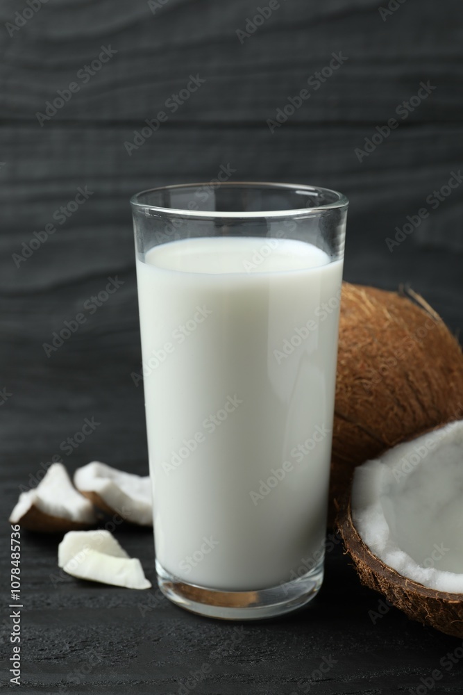 Glass of milk with coconuts on the table Glass of milk with coconuts on the table
