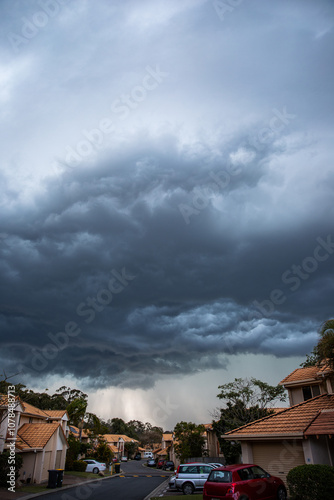 a storm rolling in over townhouses in Brisbane rain incoming photo