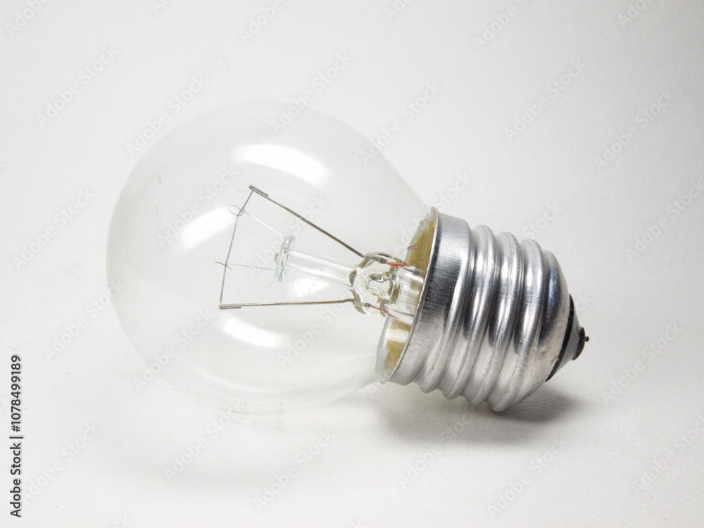 The photo shows an incandescent light bulb. Lighting. The photo shows an incandescent light bulb. Lighting.