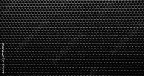 Wallpaper Mural Black perforated surface texture. Close-up view of a black perforated surface with a repeating hole pattern, creating a textured and industrial look. Torontodigital.ca