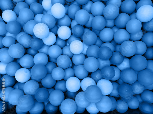 Blue color many plastic balls background