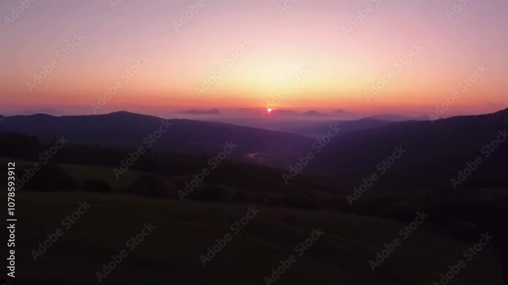 A serene sunset over mountains, showcasing vibrant colors and tranquil atmosphere, highlighting the beauty of nature. A serene sunset over mountains, showcasing vibrant colors and tranquil atmosphere, highlighting the beauty of nature.