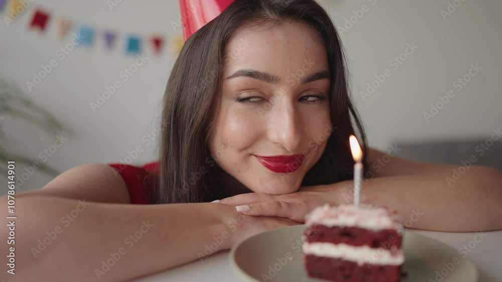 A serene image capturing a contemplative woman gazing at a birthday cake adorned with a lit candle, evoking feelings of introspection. A serene image capturing a contemplative woman gazing at a birthday cake adorned with a lit candle, evoking feelings of introspection.