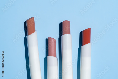 Lipstick Variety, Elegant Shades on a Pastel Background photo