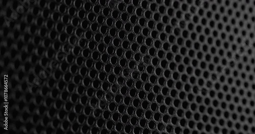 Wallpaper Mural Seamless loop. Perforated surface texture. Close-up view of a perforated surface with a repeating hole pattern. Torontodigital.ca