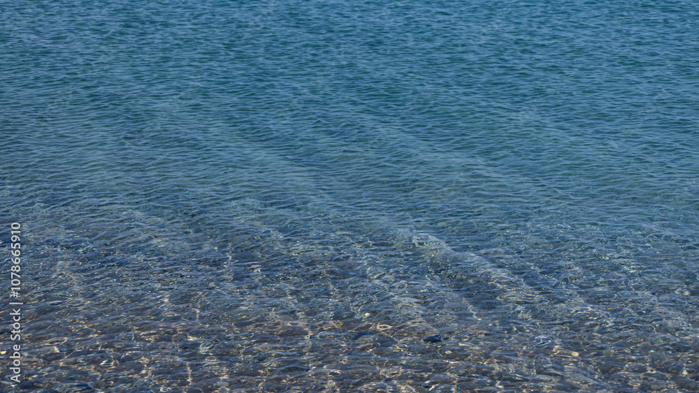 Waves On The Beach. Clear Water Of The Sea Surf And Pebble Beach. Waves On The Beach. Clear Water Of The Sea Surf And Pebble Beach.