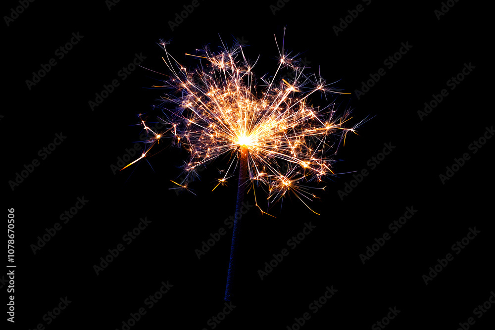 Festive sparkling sparkler close-up isolated on a black background. Festive sparkling sparkler close-up isolated on a black background.