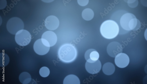 Abstract blue bokeh lights on a dark background