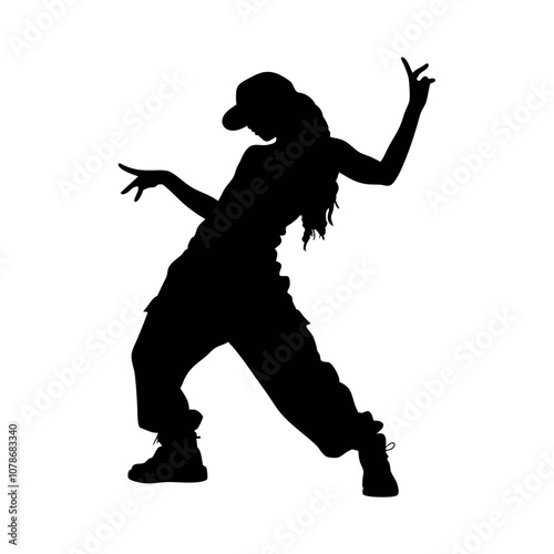 A woman is dancing in a black and white picture. She is wearing a hat and has her hands on her hips