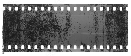 Obraz na plátne A blank film negative strip with a grungy texture on a white background, in a vi