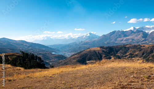 Obraz na płótnie View of the White Mountain Range with Some Clouds Around in a Sunny Day in Huaraz in the Ancash Region, Peru w salonie
