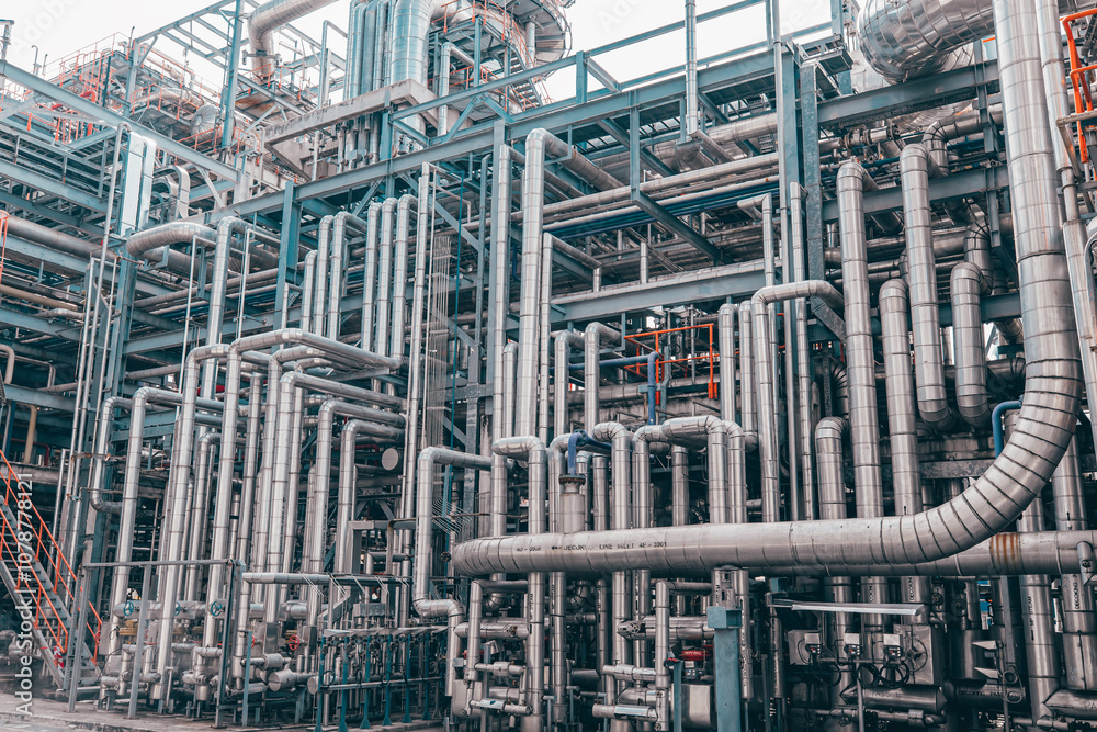 Fototapeta premium Valve elbow column refinery plant equipment for pipeline oil and gas valves at gas plant pressure safety