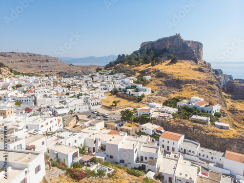 Aerial view of Lindos, Rhodes - a little old white Greek town on the Mediterranean coast to the foothills of the Acropolis if Lindos photo
