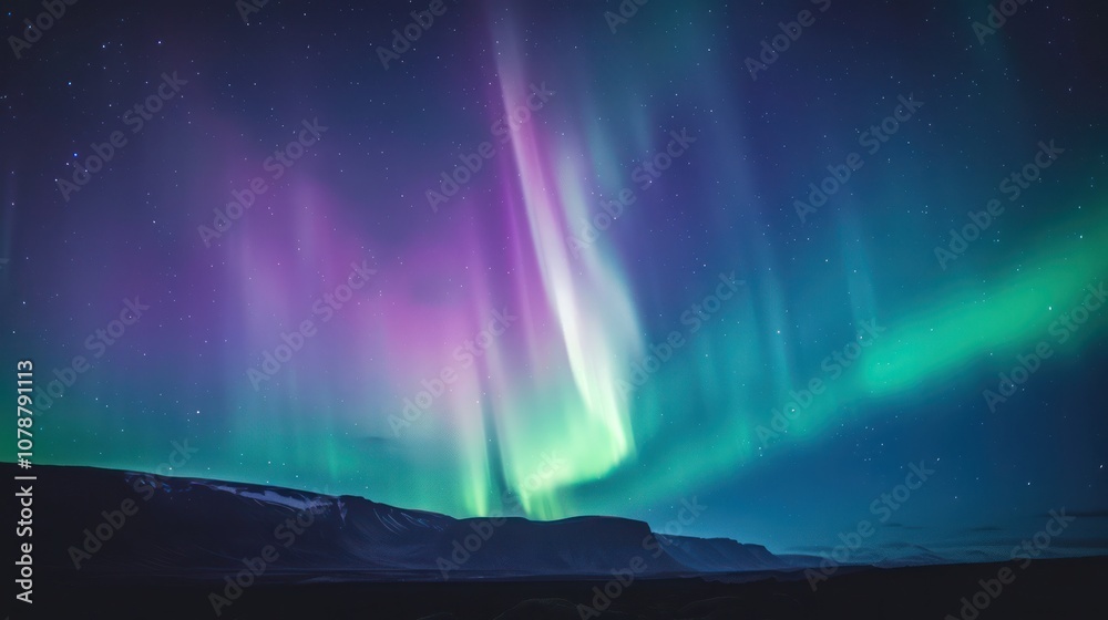 Aurora Borealis Display Over a Mountain Aurora Borealis Display Over a Mountain