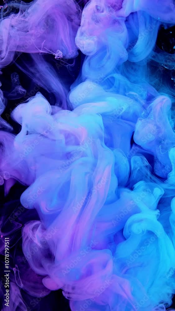 Vibrant and Captivating Swirls of Blue and Purple Smoke Gracefully Moving in Motion Vibrant and Captivating Swirls of Blue and Purple Smoke Gracefully Moving in Motion