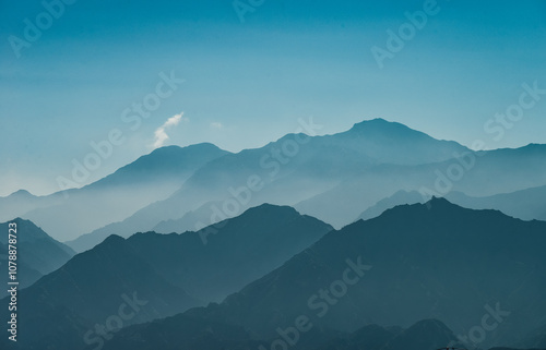 beautiful landscape of Tianshan Mountains silhouette in the morning in autumn season along Duku Highway(Rd. G217) at Kuche, Xinjiang, China