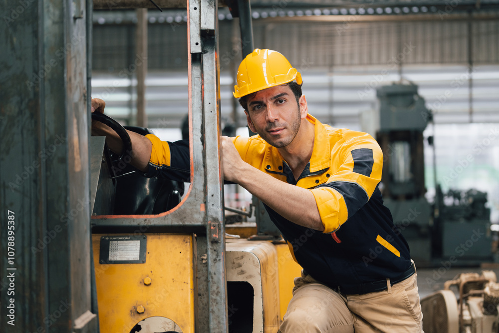 Caucasian engineer using a laptop in a factory. man working in plastics factory. Caucasian engineer using a laptop in a factory. man working in plastics factory.