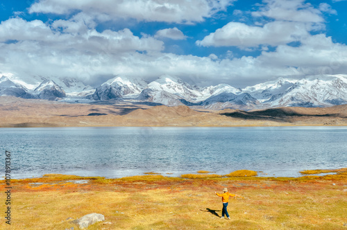 The beautiful autumn scenery of Kala Kule Lake (Karakuri Lake) on the Pamir Plateau in Akto County, Xinjiang, China. photo