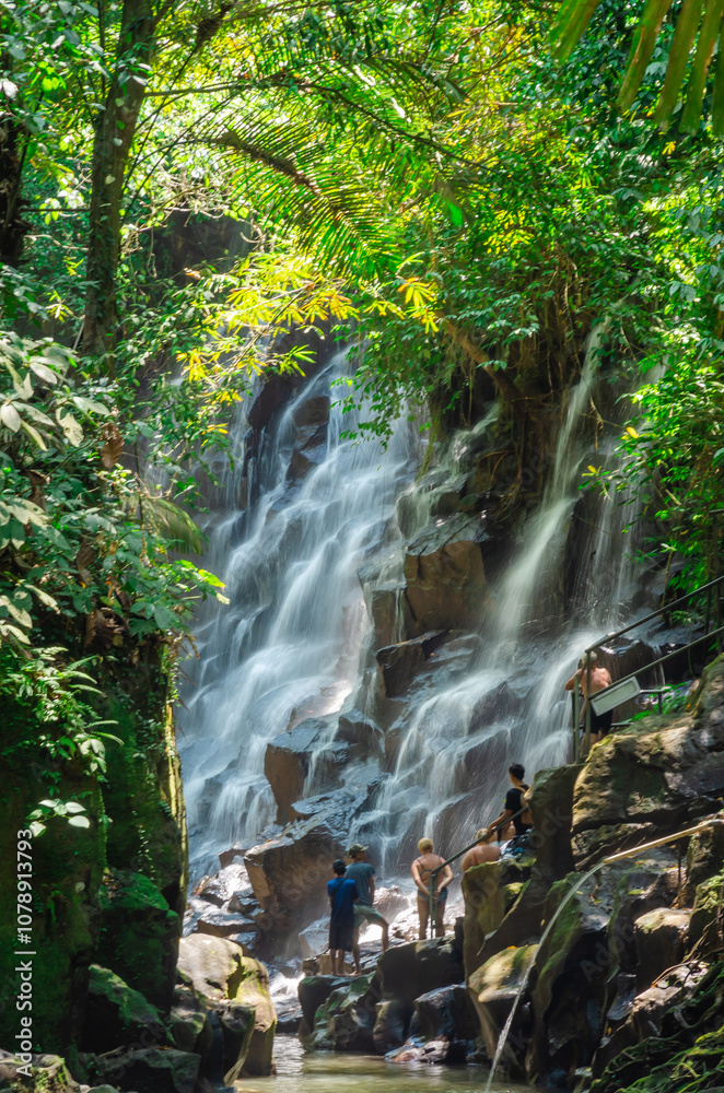 Beautiful Kanto Lampo waterfall in tropical rainforest in Bali, Indonesia