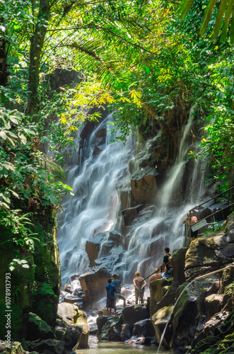 Obraz na płótnie Beautiful Kanto Lampo waterfall in tropical rainforest in Bali, Indonesia w salonie