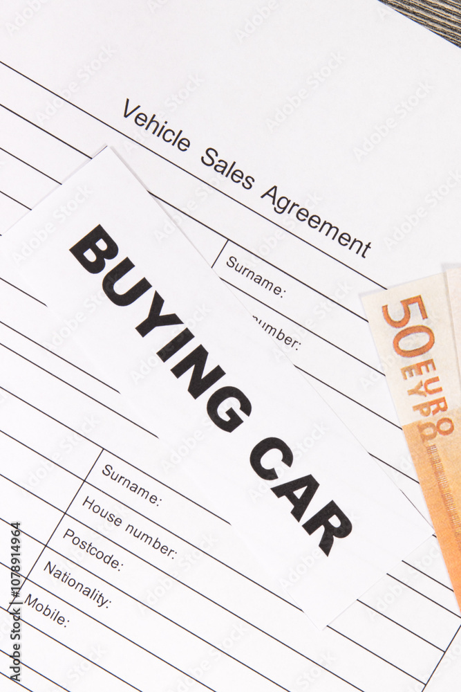 Vehicle sales agreement, inscription buying car and euro banknotes. Sales, buying new or used car Vehicle sales agreement, inscription buying car and euro banknotes. Sales, buying new or used car