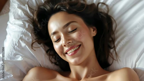 Woman's face during an orgasm in bed. Women's pleasure. A beautiful female with soft skin is enjoying and feels good