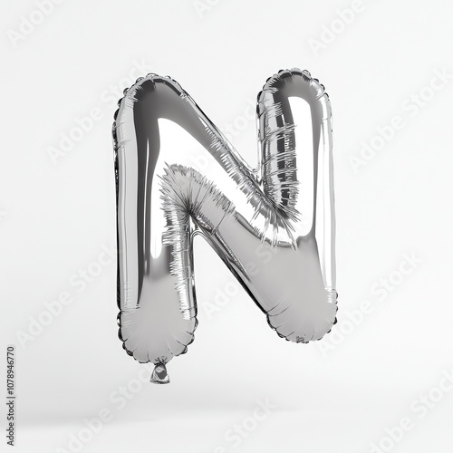 Silver balloon shaped like the letter 