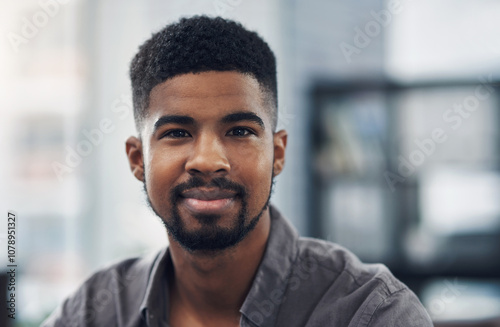 Portrait, business and creative black man in startup for career, job opportunity and working in office. Face, confidence and African professional, entrepreneur or copywriter in enterprise in Nigeria