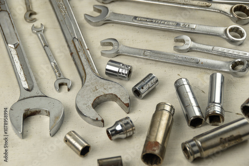 Set of hand tools such as open, ring and ratchet spanner, wrench, sockets, and deep sockets isolated on white background.