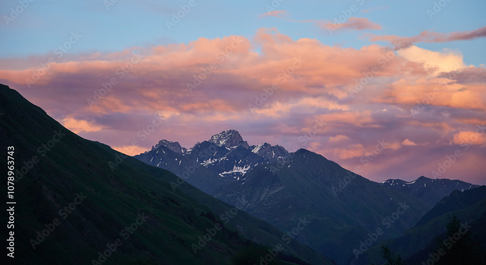 Mountain peaks in Georgia at sunset. Natural beauty. The time of the year is summer Mountain peaks in Georgia at sunset. Natural beauty. The time of the year is summer