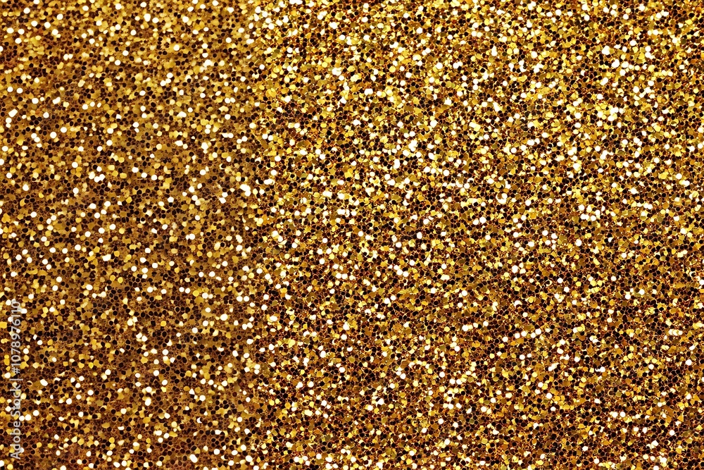 a close up of a gold glitter background with a lot of small dots