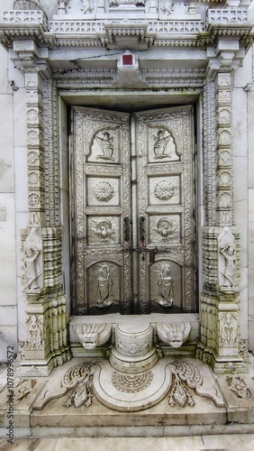 A door made with pure silver.  Door of a Jain temple called shikhar ji situated at Giridih, Jharkhand in India  photo