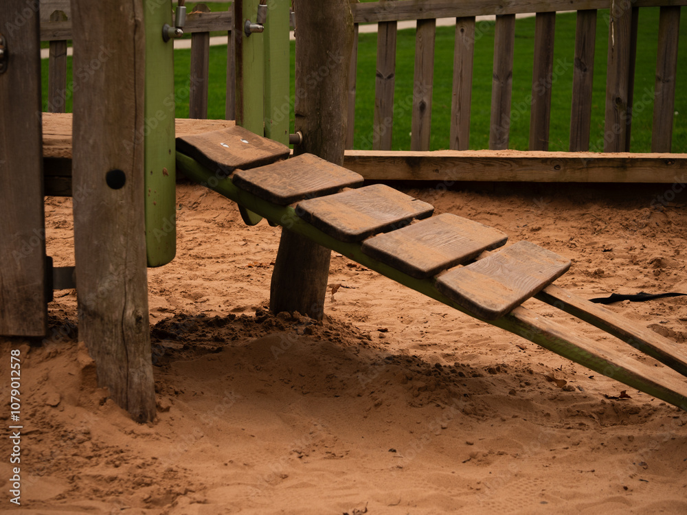 Sand pit in childrens adventure playground park Sand pit in childrens adventure playground park