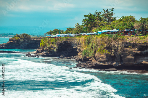 Beautiful Uluwatu coast with rocks and ocean waves, Bali, Indonesia