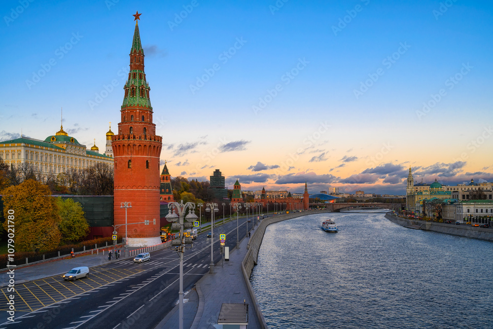 Sunset view of Moscow Kremlin, Kremlin Embankment and Moscow River in Moscow, Russia. Architecture and landmark of Moscow Sunset view of Moscow Kremlin, Kremlin Embankment and Moscow River in Moscow, Russia. Architecture and landmark of Moscow