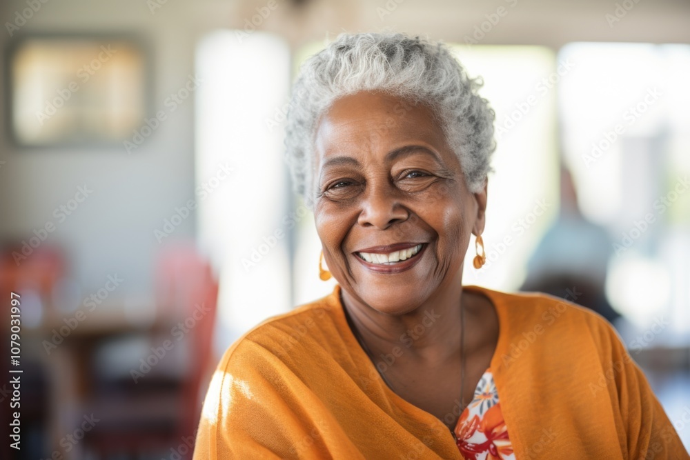 Smiling portrait of a senior African American woman in nursing home Smiling portrait of a senior African American woman in nursing home