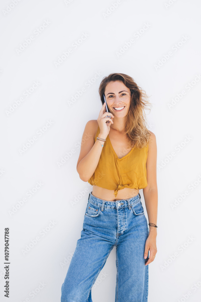 Woman with smartphone standing in relax posture Woman with smartphone standing in relax posture