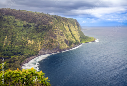 Pacific Ocean waves break on the beach of the Waipo Valley, on the Hamakua Coast of the Big Island of Hawaii, the boyhood home of Kamehmeha I, the first King of a united Hawaii.