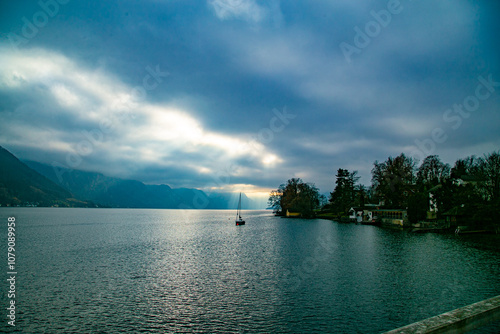 Austria. Alps. Traunsee. Traunkirche. Ort Castle. Hallstatt. Yacht on an Alpine lake. photo