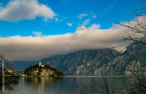 Austria. Alps. Traunsee. Traunkirche. Ort Castle. Hallstatt. Yacht on an Alpine lake. photo